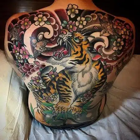 Tatuaje de tigre y serpiente