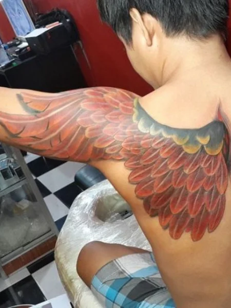 Tatuaje de alas de fenix
